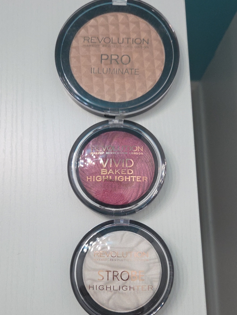 Revolution Vivid Baked Highlighter Trio – Pink, Champagne & Rose Gold